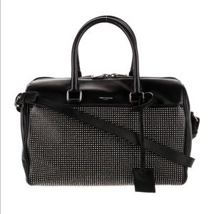 Saint Laurent Top Handle Bag
Includes Dust Bag